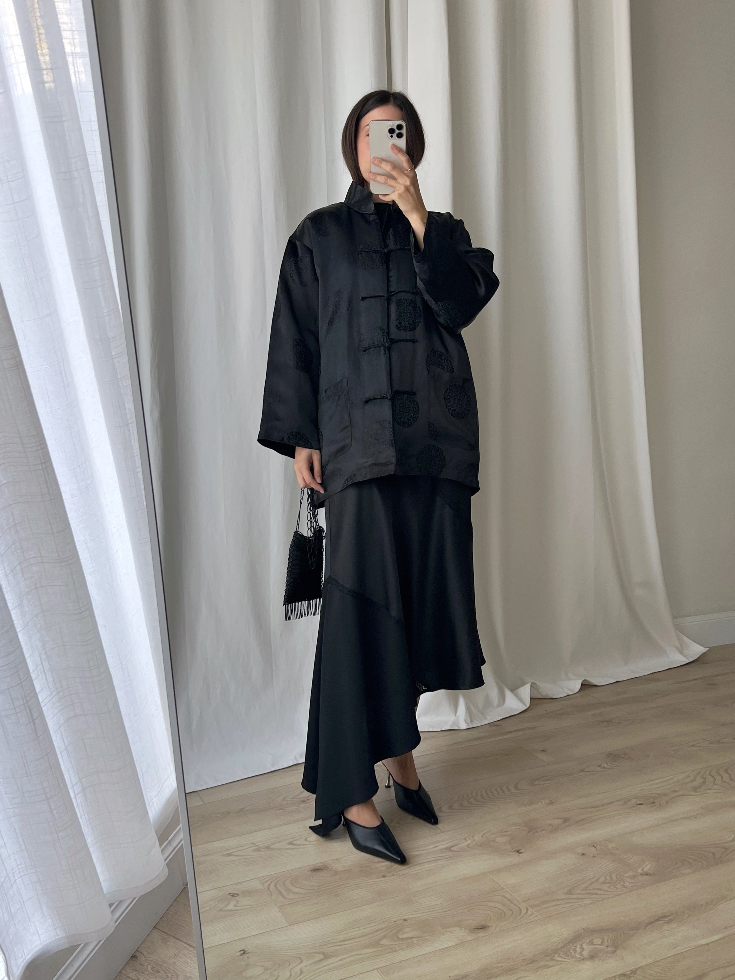 Asymmetrical black midi skirt