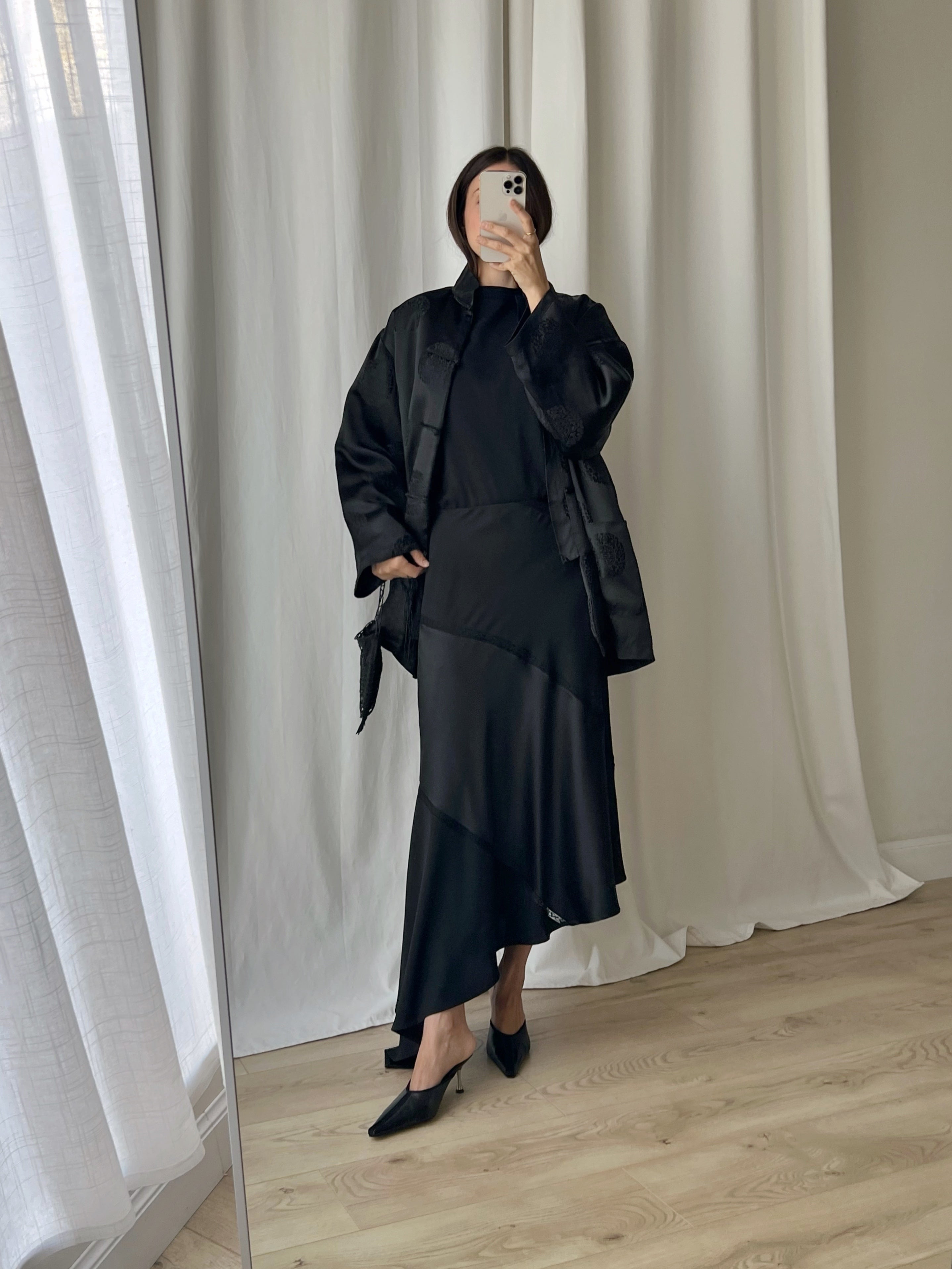Asymmetrical black midi skirt