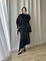 Asymmetrical black midi skirt