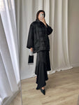 Asymmetrical black midi skirt
