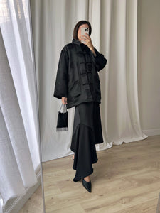 Asymmetrical black midi skirt