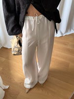 Cupro and viscose liquid white pants