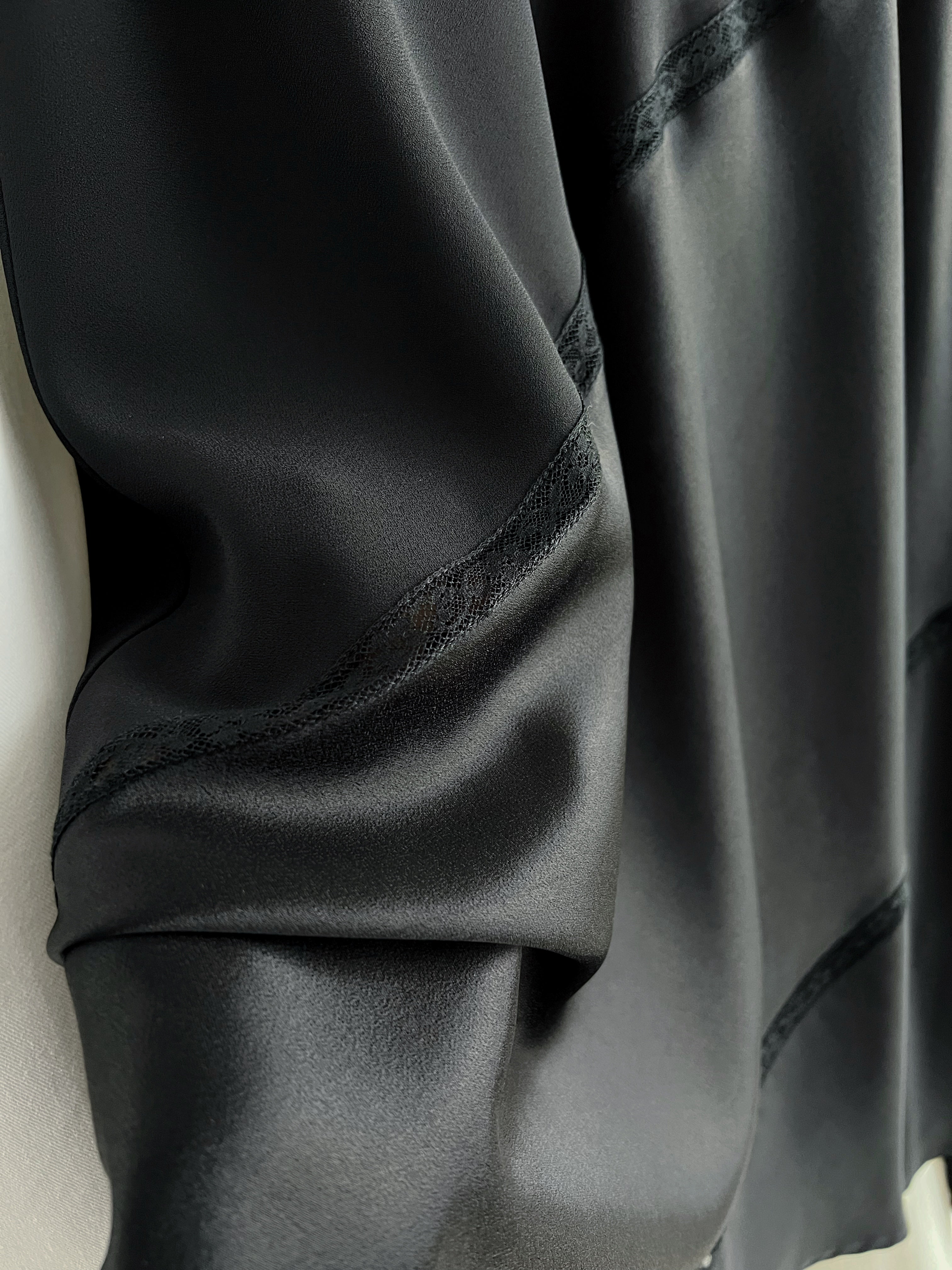 Asymmetrical black midi skirt