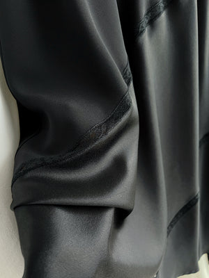 Asymmetrical black midi skirt
