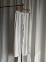 Cupro and viscose liquid white pants