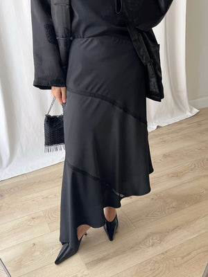Asymmetrical black midi skirt