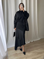 Asymmetrical black midi skirt