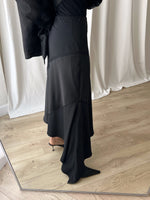 Asymmetrical black midi skirt