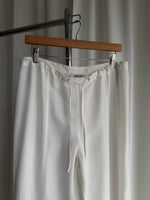 Cupro and viscose liquid white pants
